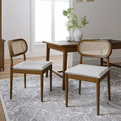 Sedia da pranzo moderna in rattan con gambe in legno massello